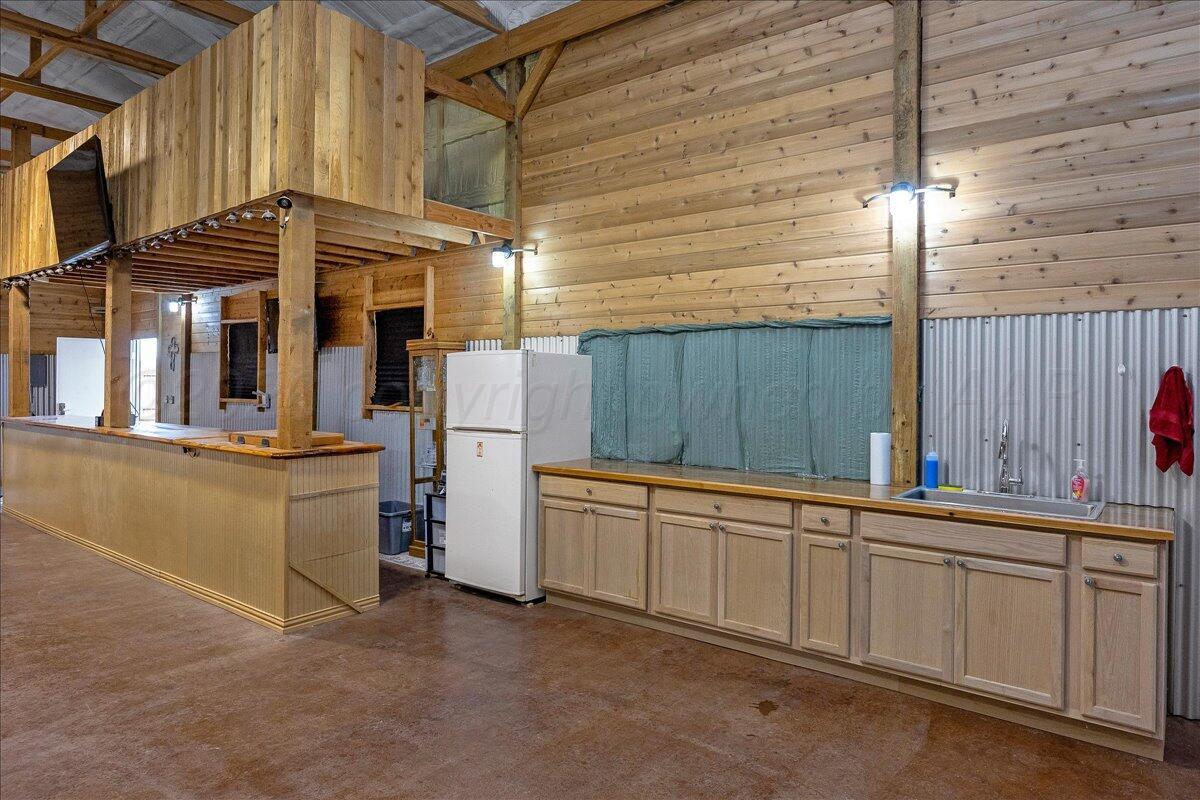 4801 Cedar Springs Trail Amarillo, TX 79119 - Photo 37 of 41 a view of a kitchen with furniture and a window