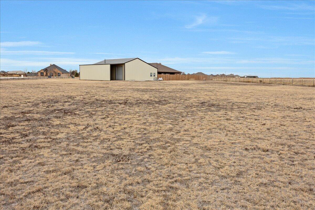 4801 Cedar Springs Trail Amarillo, TX 79119 - Photo 40 of 41 a view of ocean with a beach