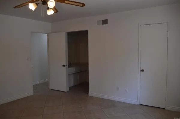 a kitchen with granite countertop stainless steel appliances and cabinets