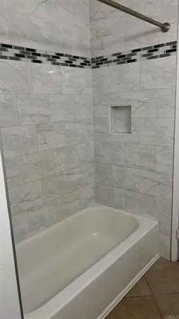 a close view of a bathtub in bathroom