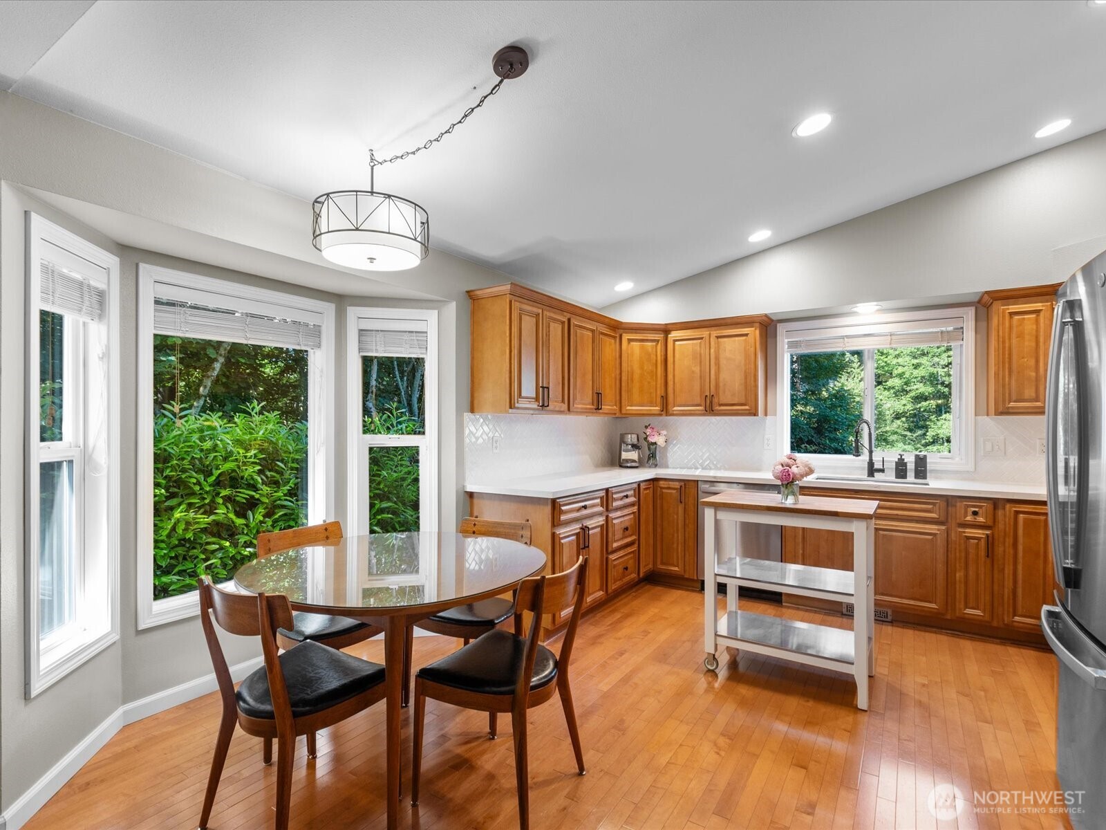 3218 189th Street Southeast Bothell, WA 98012 - Photo 12 of 40 a view of a dining room with furniture window and outside view