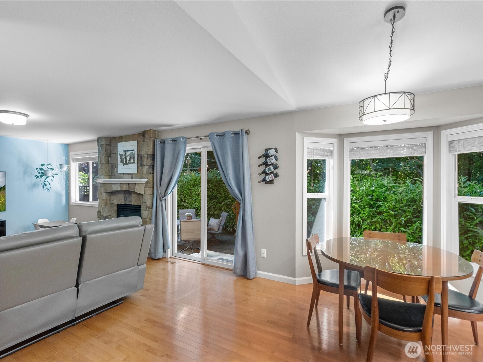 3218 189th Street Southeast Bothell, WA 98012 - Photo 13 of 40 a view of a livingroom with furniture window and wooden floor