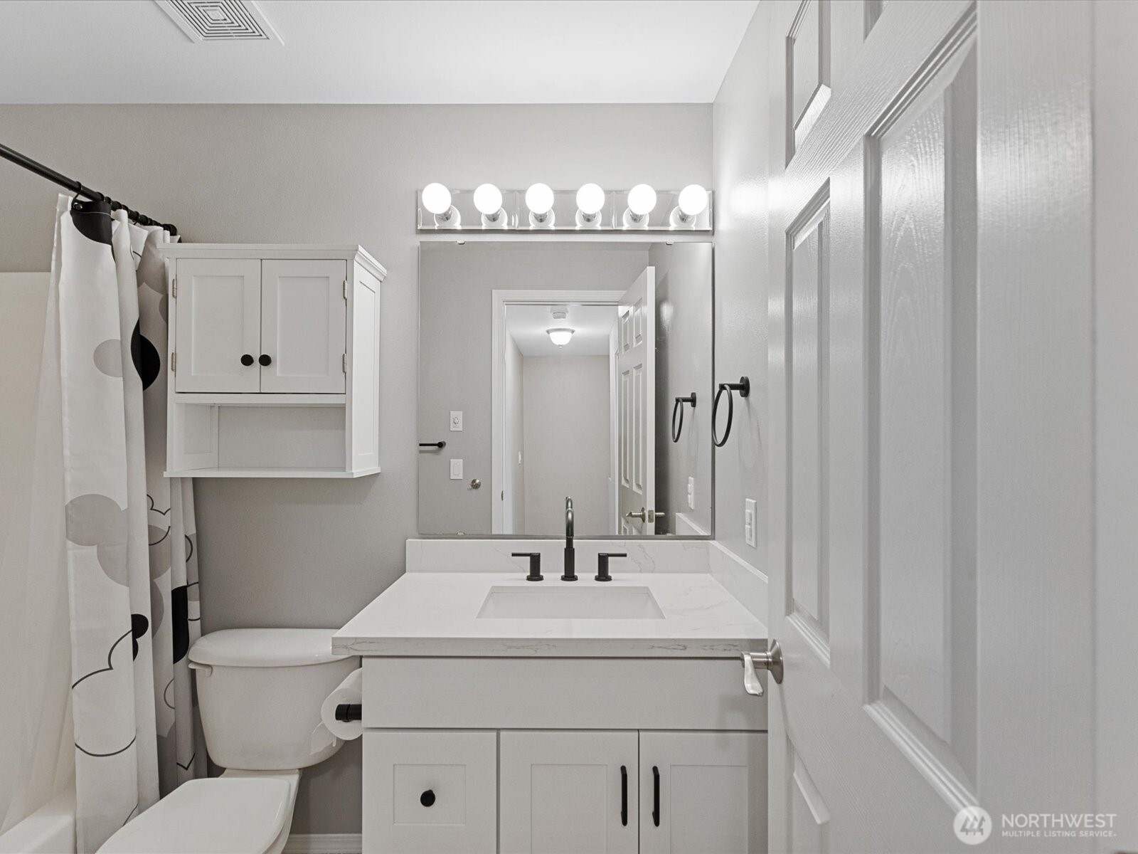 3218 189th Street Southeast Bothell, WA 98012 - Photo 26 of 40 a bathroom with a sink toilet and shower