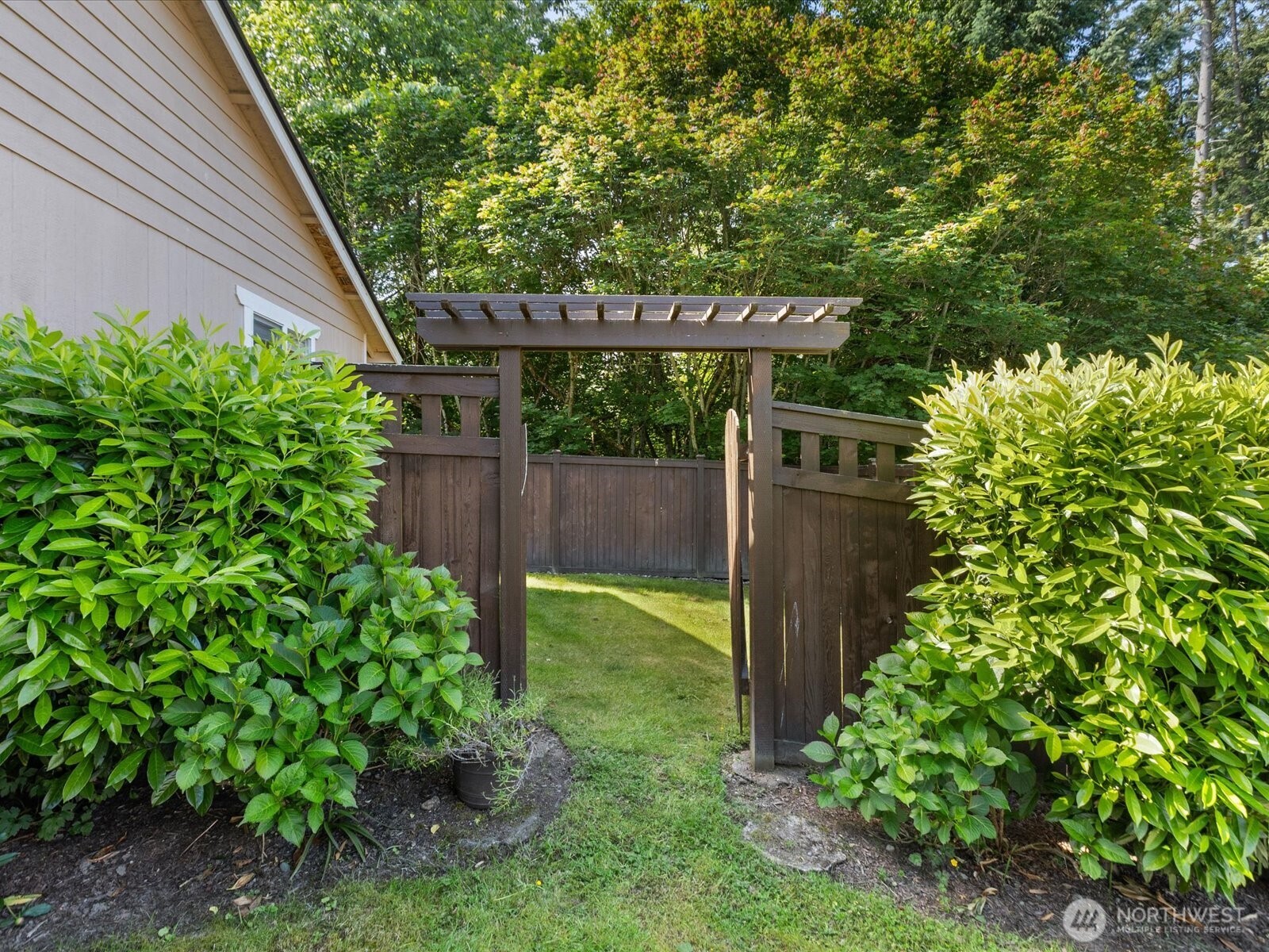 3218 189th Street Southeast Bothell, WA 98012 - Photo 31 of 40 a backyard of a house with lots of green space
