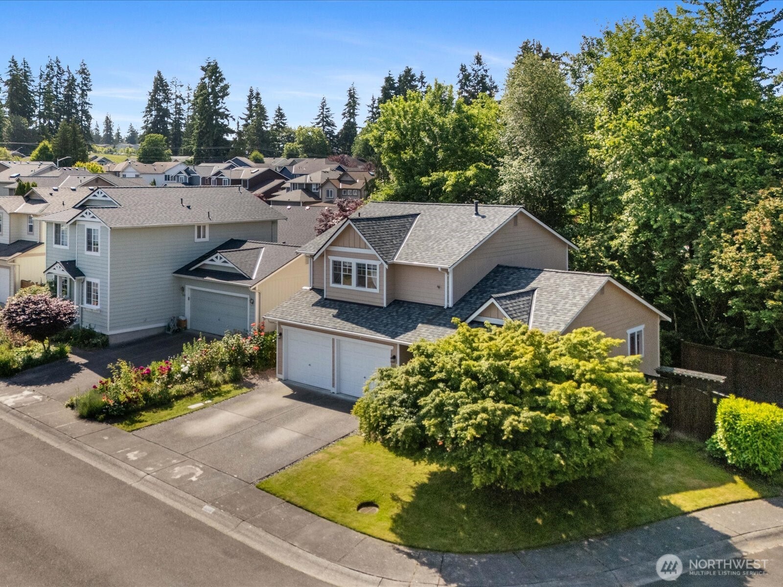 3218 189th Street Southeast Bothell, WA 98012 - Photo 36 of 40 a aerial view of a house with a yard and outdoor seating