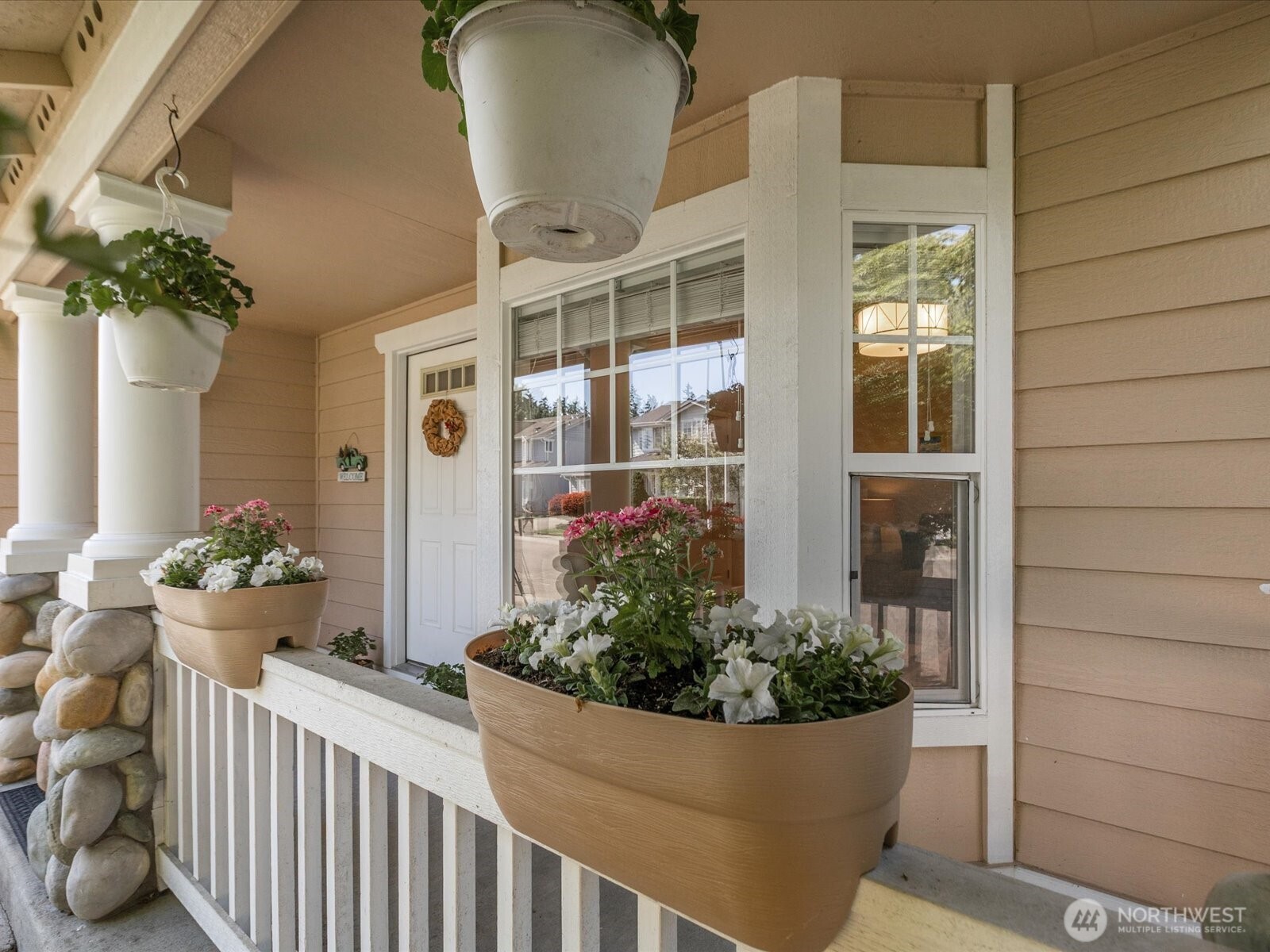 3218 189th Street Southeast Bothell, WA 98012 - Photo 4 of 40 a front view of a house having fountain