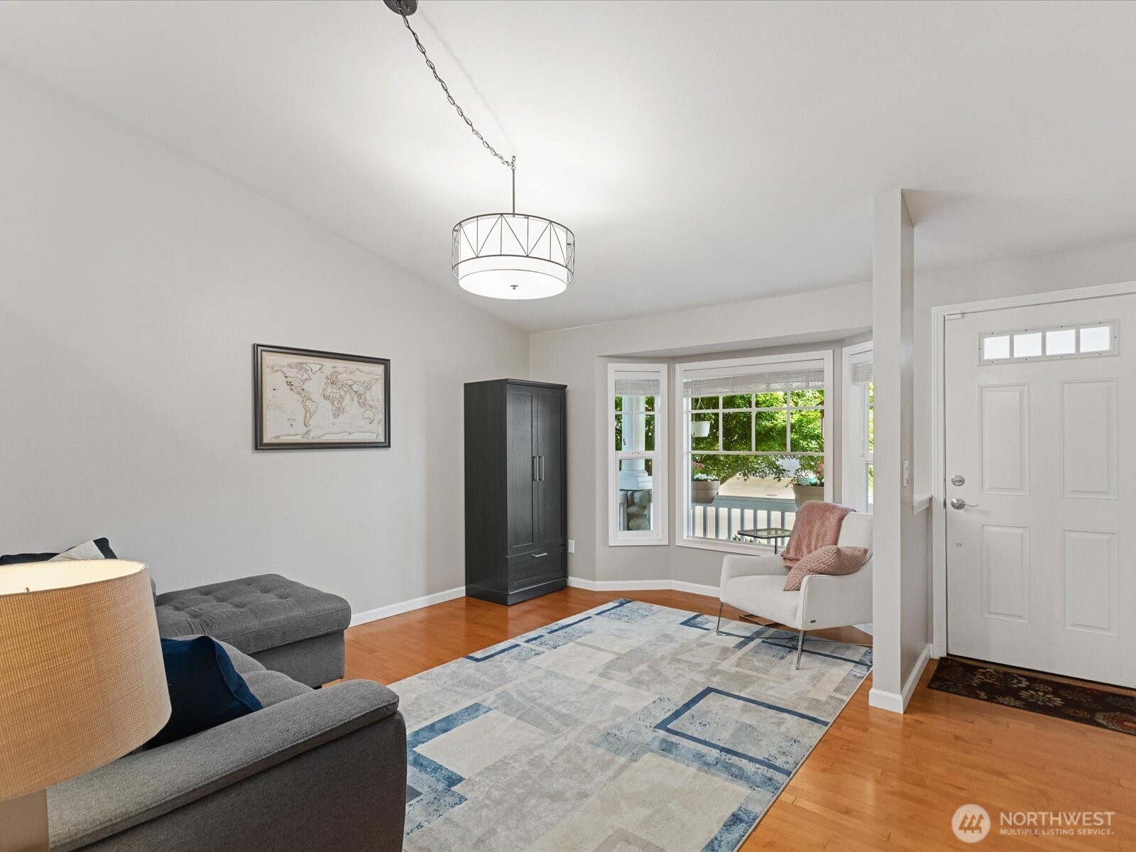 3218 189th Street Southeast Bothell, WA 98012 - Photo 7 of 40 a living room with furniture and a window