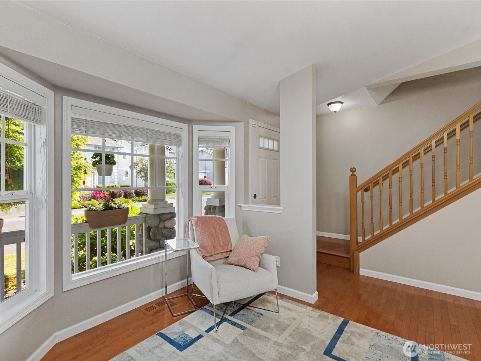 3218 189th Street Southeast Bothell, WA 98012 - Photo 9 of 40 a living room with furniture and a window