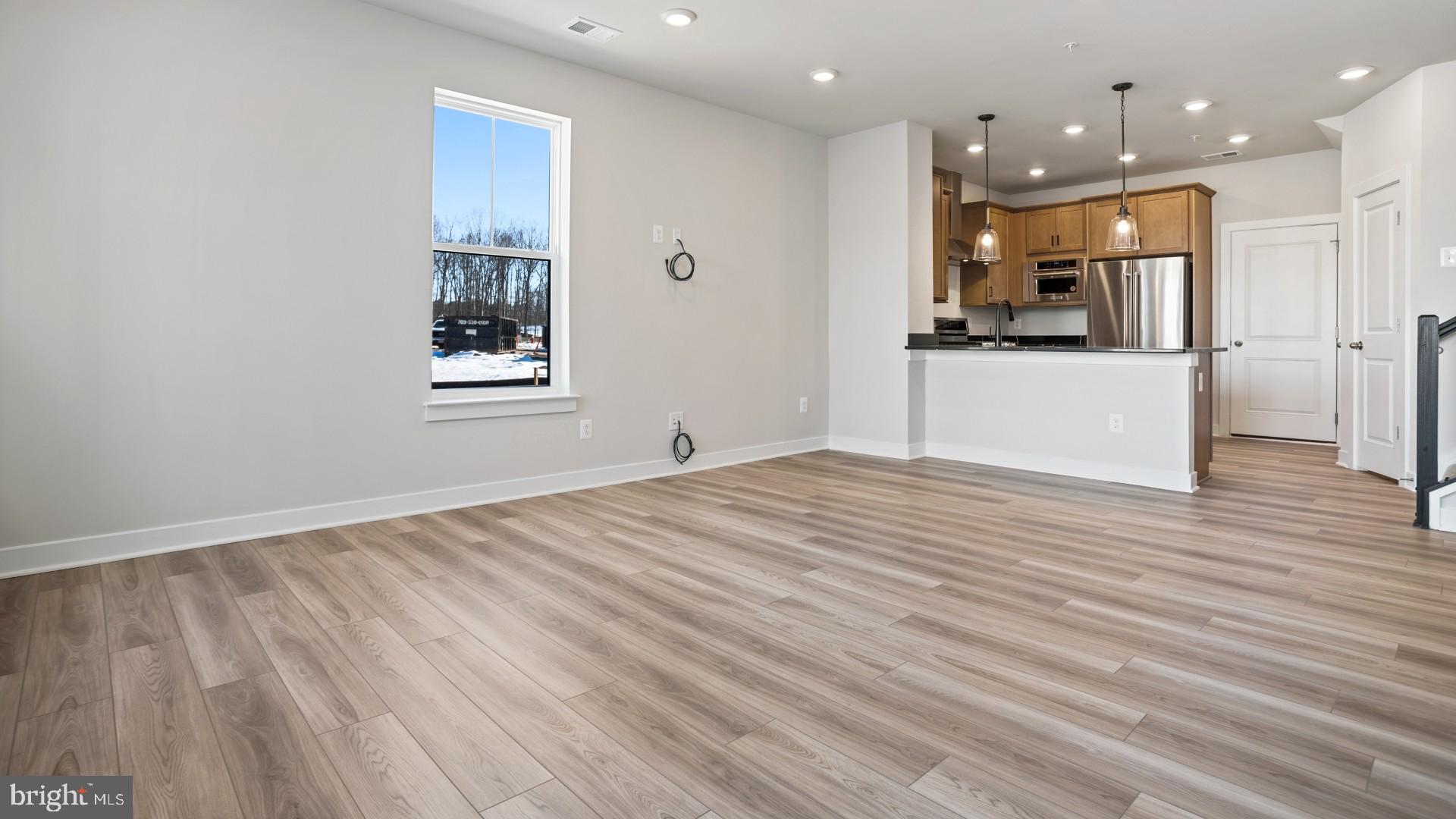 45176 Drowes Terrace Sterling, VA 20166 - Photo 4 of 15 a view of kitchen and wooden floor