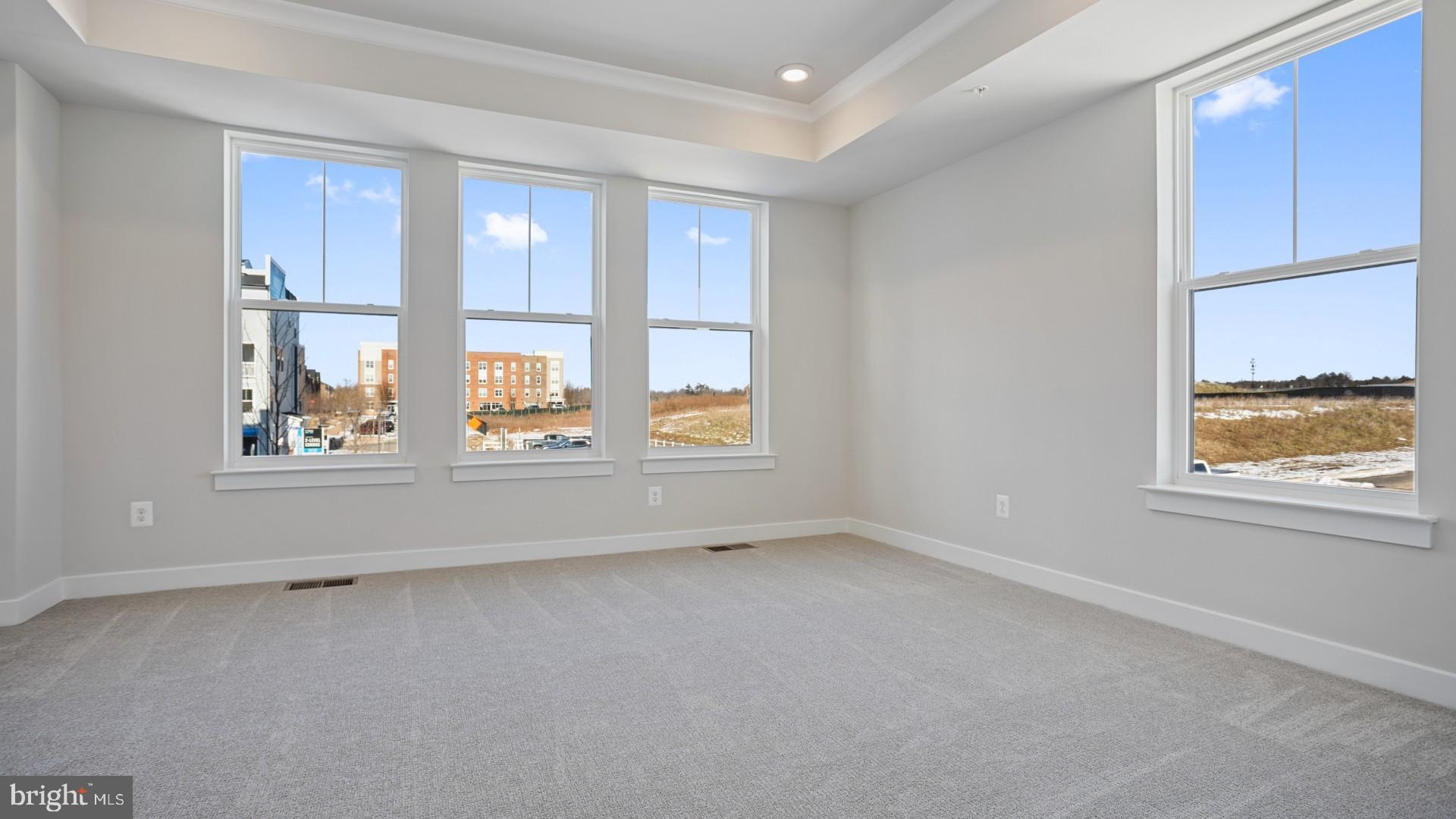 45176 Drowes Terrace Sterling, VA 20166 - Photo 7 of 15 an empty room with windows