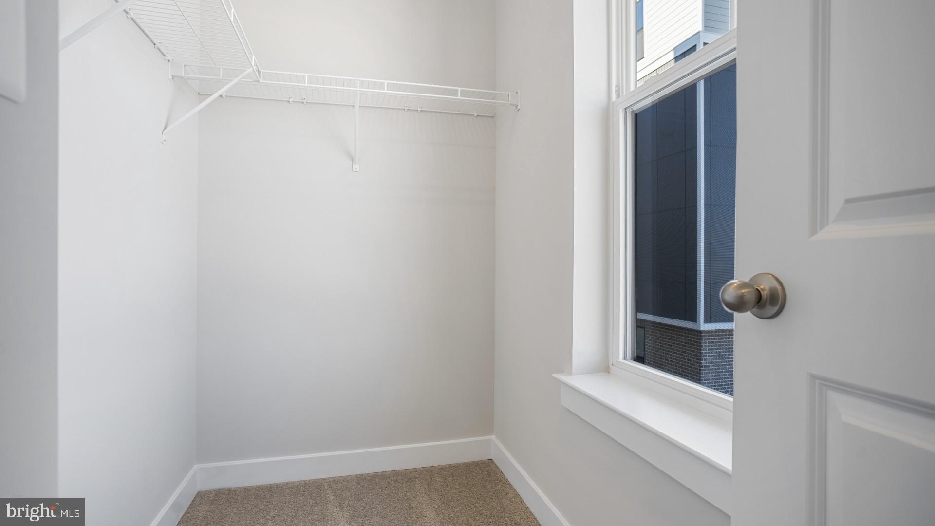 45176 Drowes Terrace Sterling, VA 20166 - Photo 9 of 15 a view of small space with racks on the wall