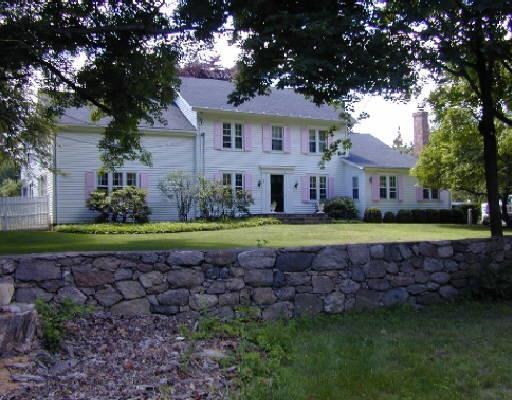 a view of a house with a big yard