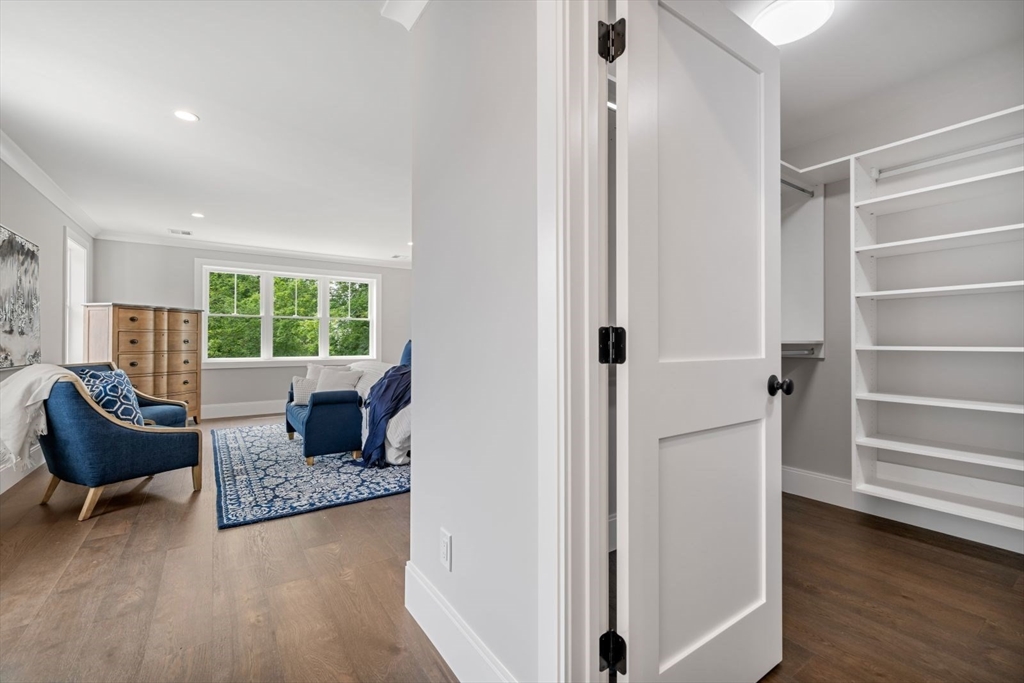 7 Milk Street Natick, MA 01760 - Photo 21 of 39 a living room with furniture and a window