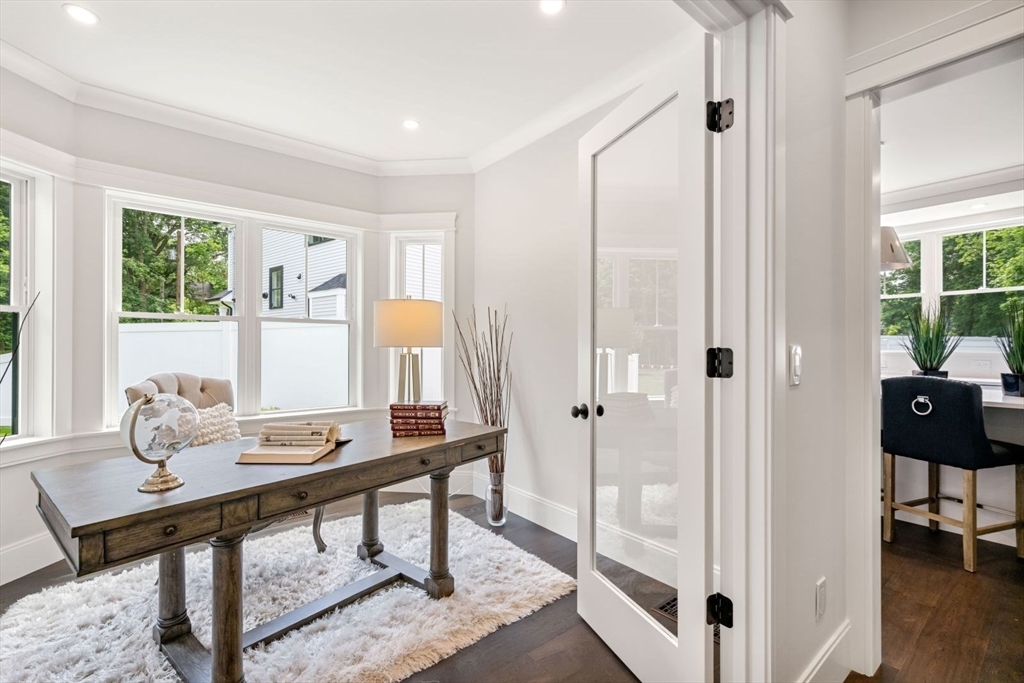 7 Milk Street Natick, MA 01760 - Photo 7 of 39 a view of a workspace with furniture and a window