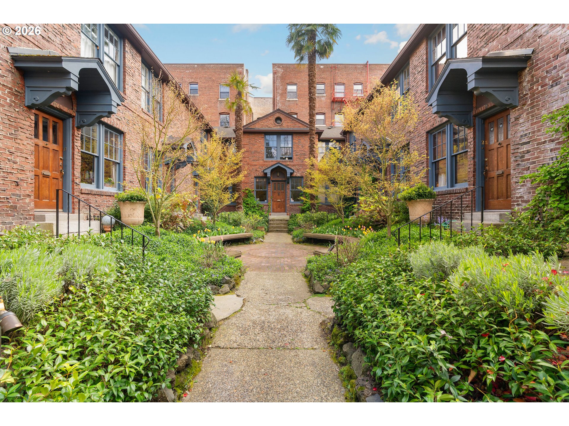 2182 Northwest Hoyt Street, Unit 8 Portland, OR 97210 - Photo 2 of 26 a view of pathway both side of building