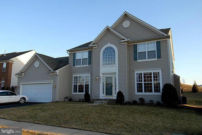 18517 Cornflower Road Boyds, MD 20841 - Photo 1 of 2 a front view of a house with a yard