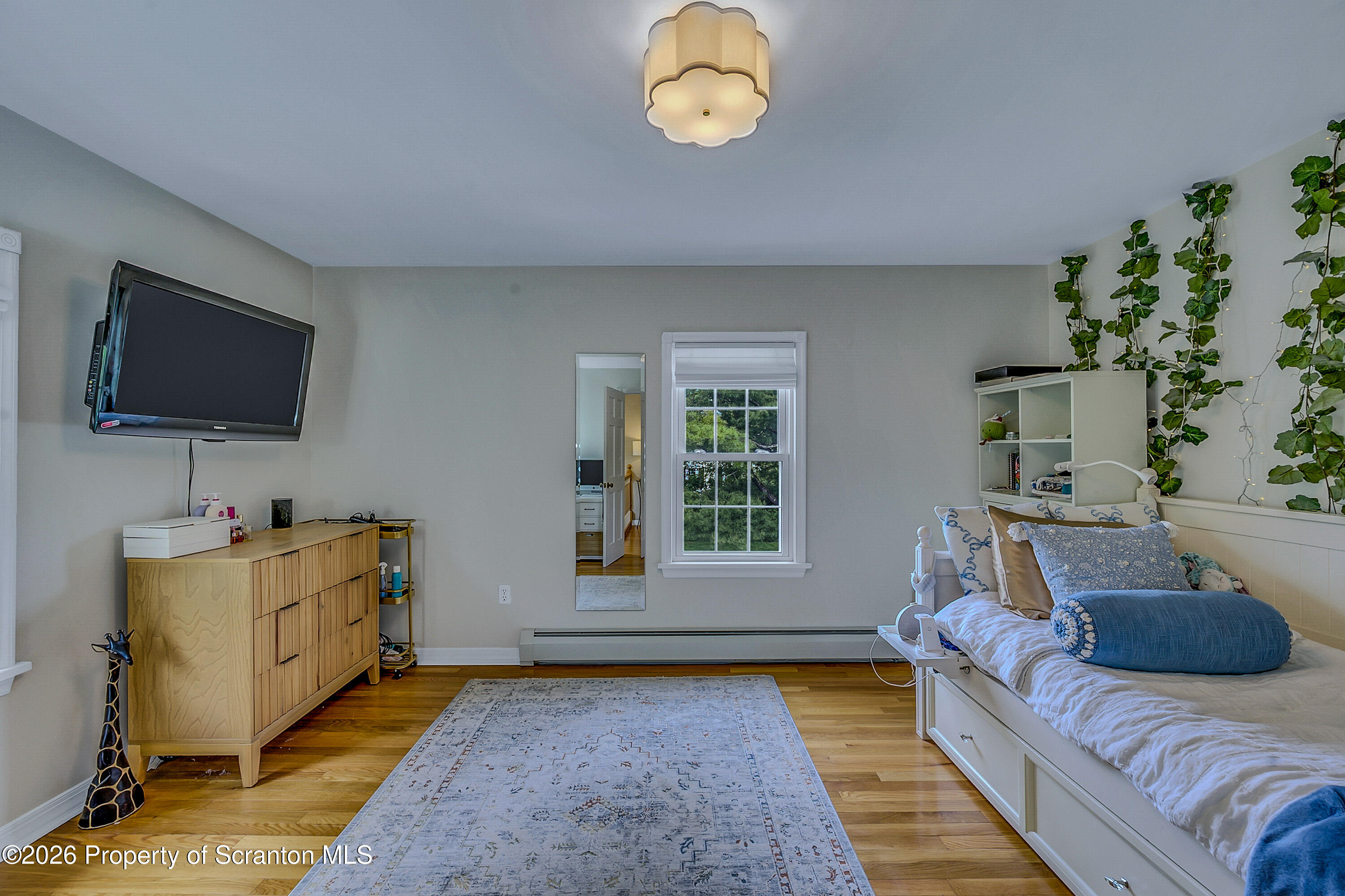 330 Glenburn Road Clarks Green, PA 18411 - Photo 49 of 69 a bedroom with furniture and a flat screen tv
