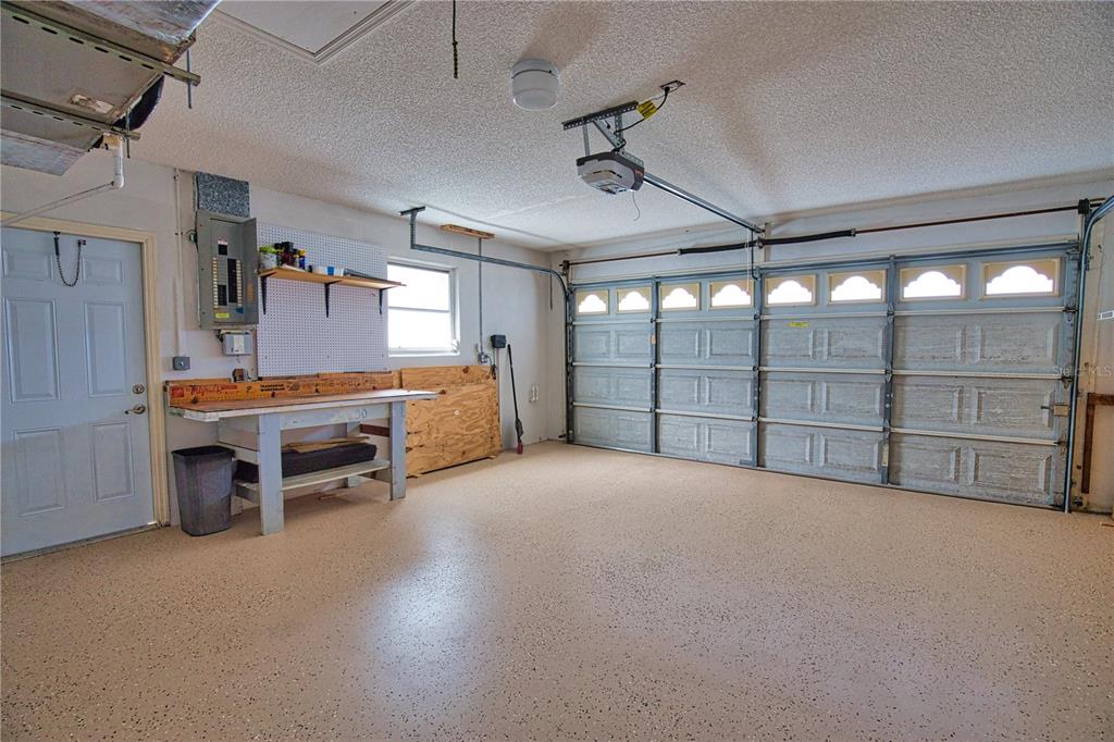 5847 Buchanan Road Venice, FL 34293 - Photo 22 of 47 a view of a livingroom with furniture and a ceiling fan