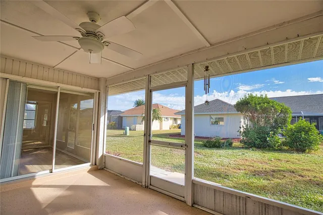 a view of an empty room with a balcony