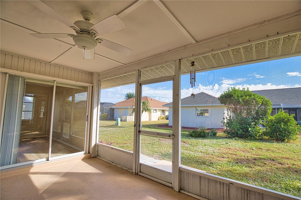 5847 Buchanan Road Venice, FL 34293 - Photo 35 of 47 a view of an empty room with a balcony