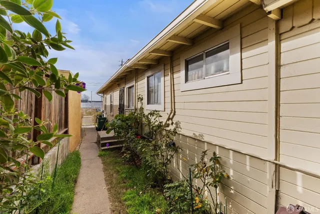 a backyard of a house with lots of green space