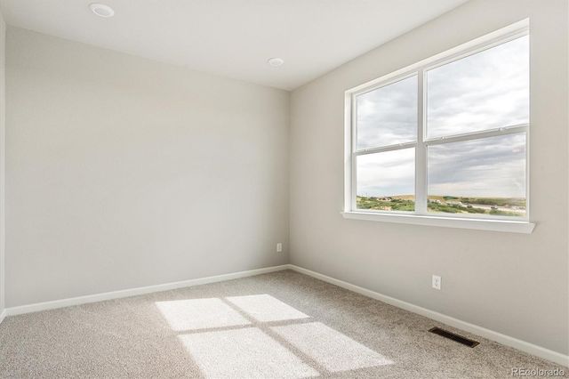 an empty room with a window