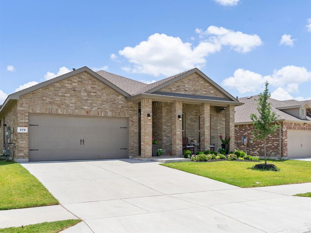 270 Lunayena Road Rhome, TX 76078 - Photo 2 of 37 Welcome to 270 Lunayena Rd. in Rhome, Texas. This inviting front elevation showcases the home's curb appeal, spacious homesite, and peaceful setting, offering the ideal blend of country living with convenient access to major highways, shopping, dining, and the greater DFW area.