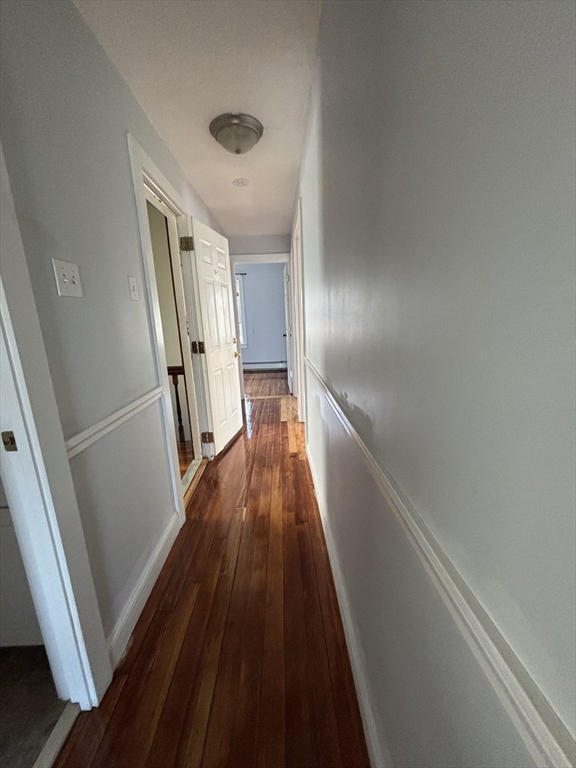 47 Middle Street Boston, MA 02127 - Photo 5 of 12 a view of gallery with wooden floor