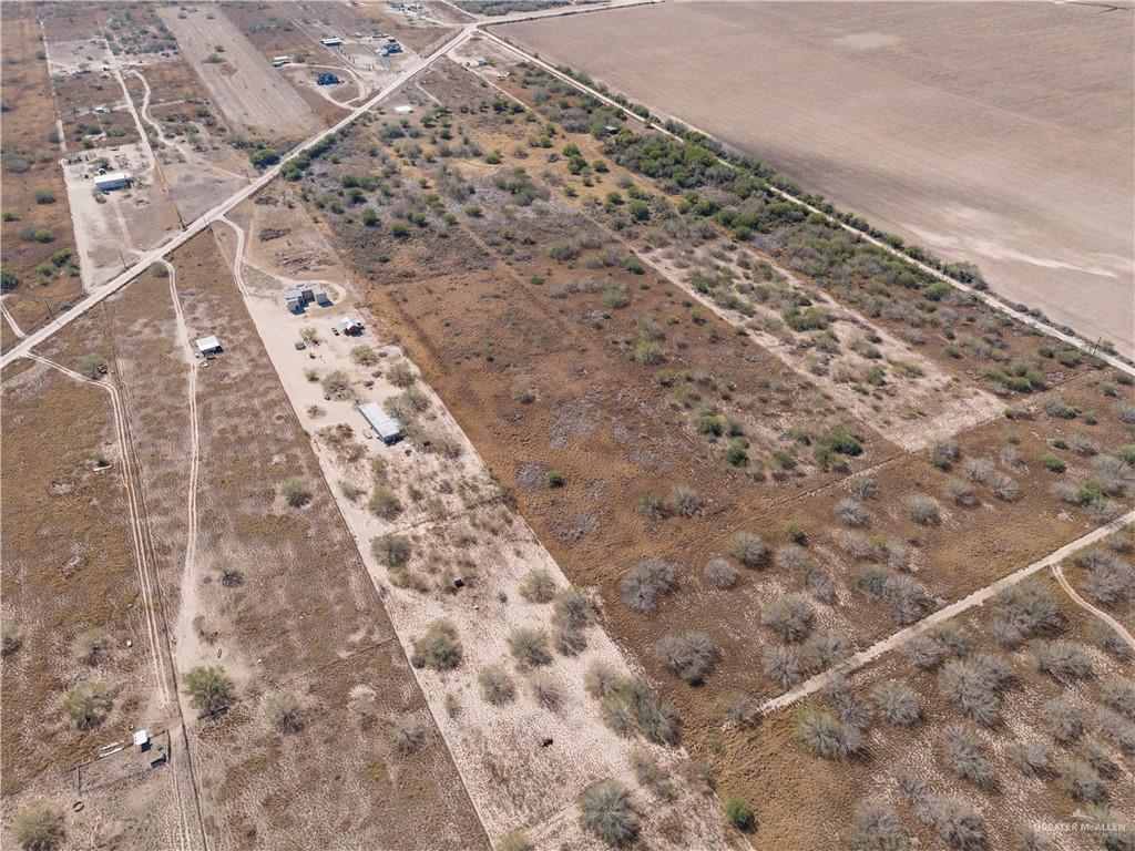 1987 Garcia's Camp Road Rio Grande City, TX 78582 - Photo 5 of 7 view of a backyard