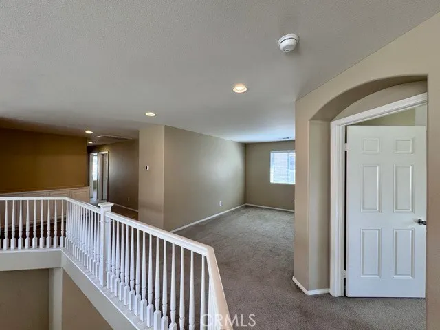 a view of hallway with livingroom