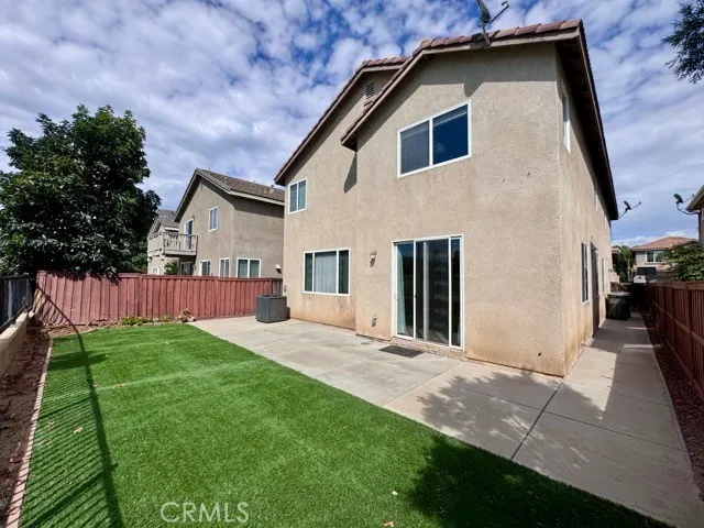 a view of a swimming pool with an outdoor space