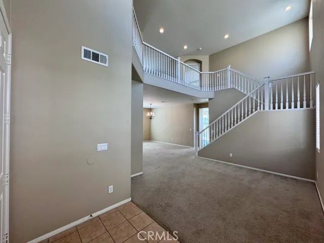a view of entryway with stairs