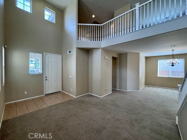 a view of a hallway with entryway