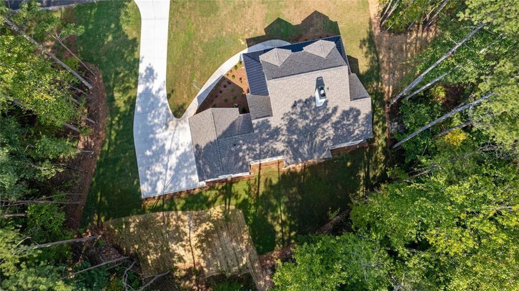 240 Highlands Ball Ground, GA 30107 - Photo 55 of 57 a view of a house with a yard