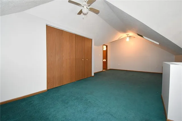 a view of a room with windows