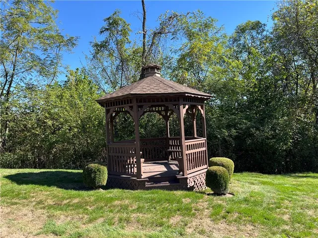 a sign on a pole on a street