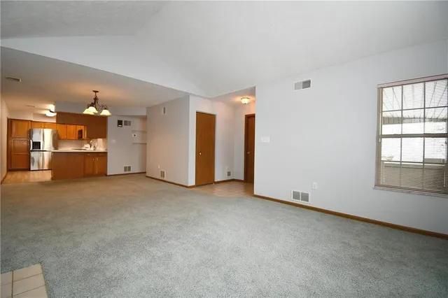 an empty room with a bathroom