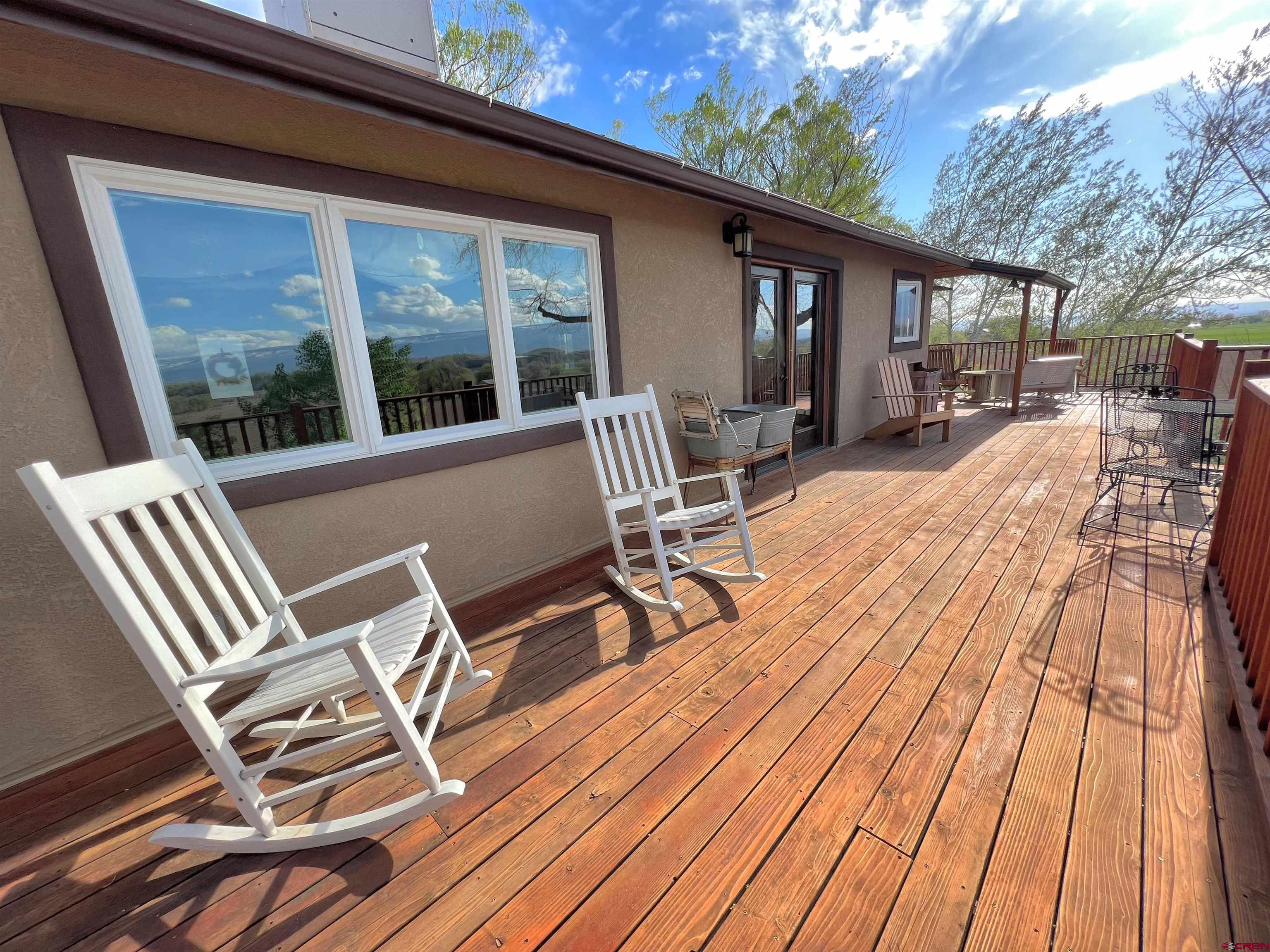 7571 2200th Road Delta, CO 81416 - Photo 26 of 35 a view of a chairs on wooden deck