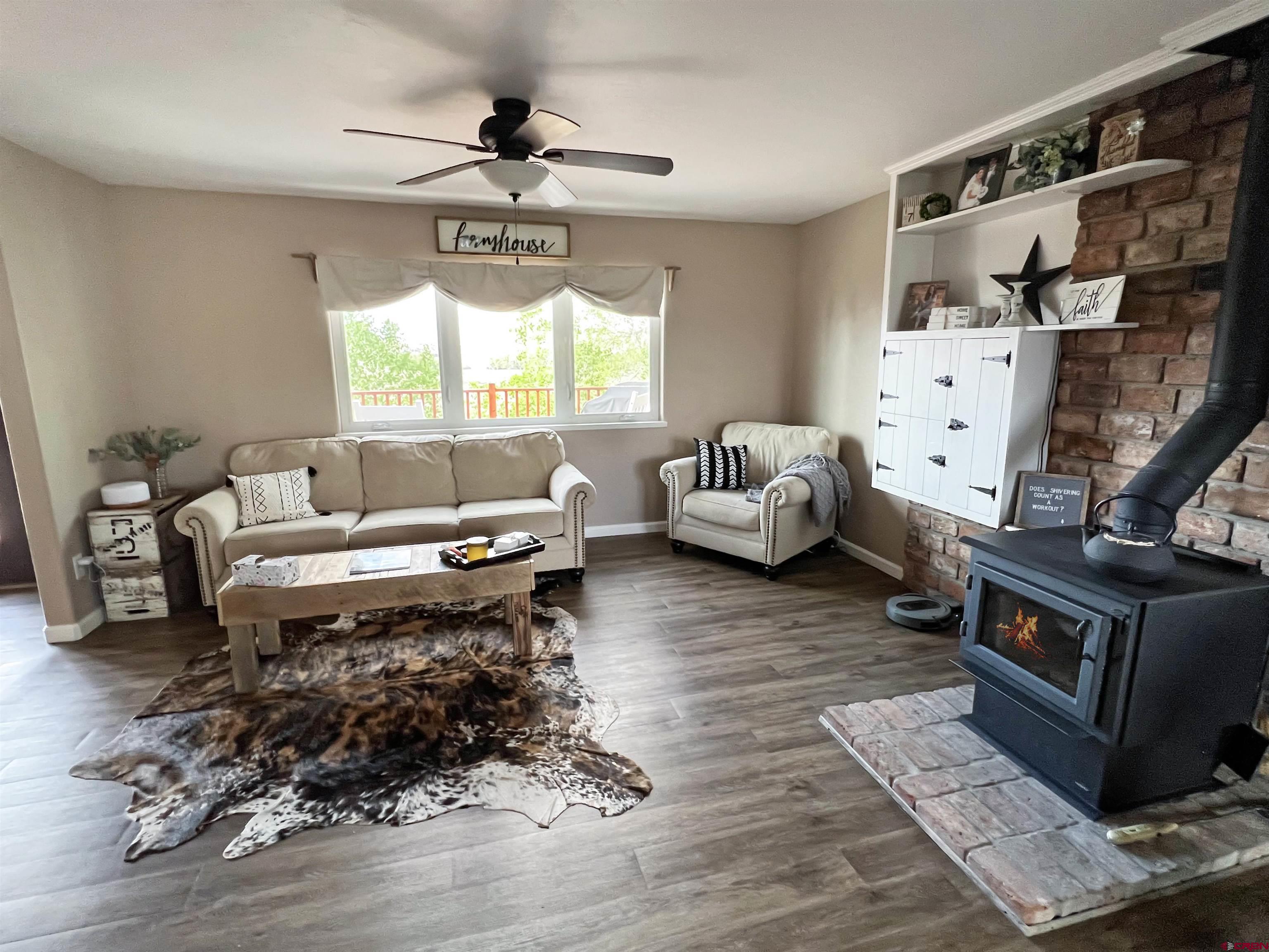 7571 2200th Road Delta, CO 81416 - Photo 3 of 35 a living room with furniture and a window
