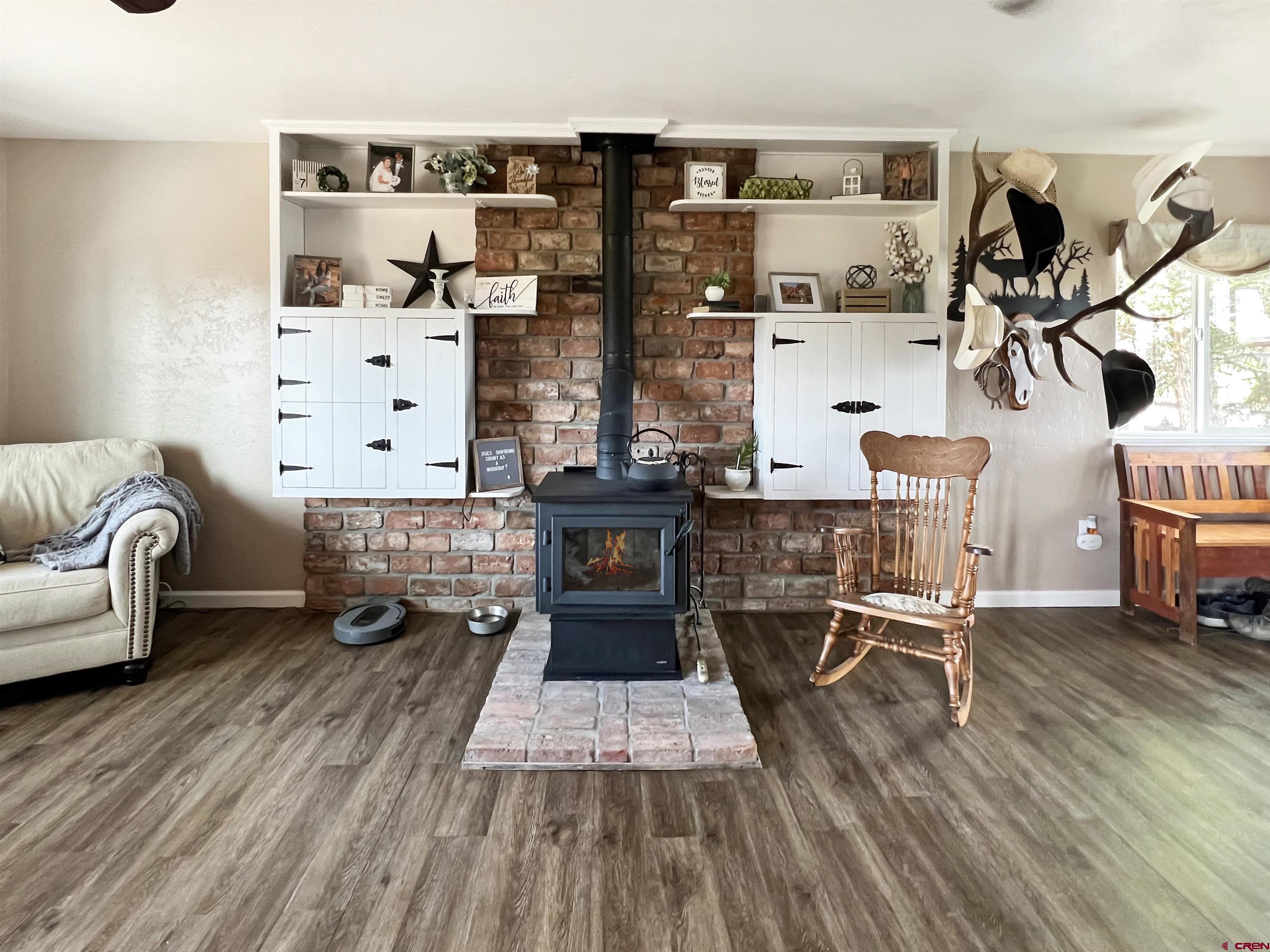 7571 2200th Road Delta, CO 81416 - Photo 5 of 35 a room with furniture and wooden floor