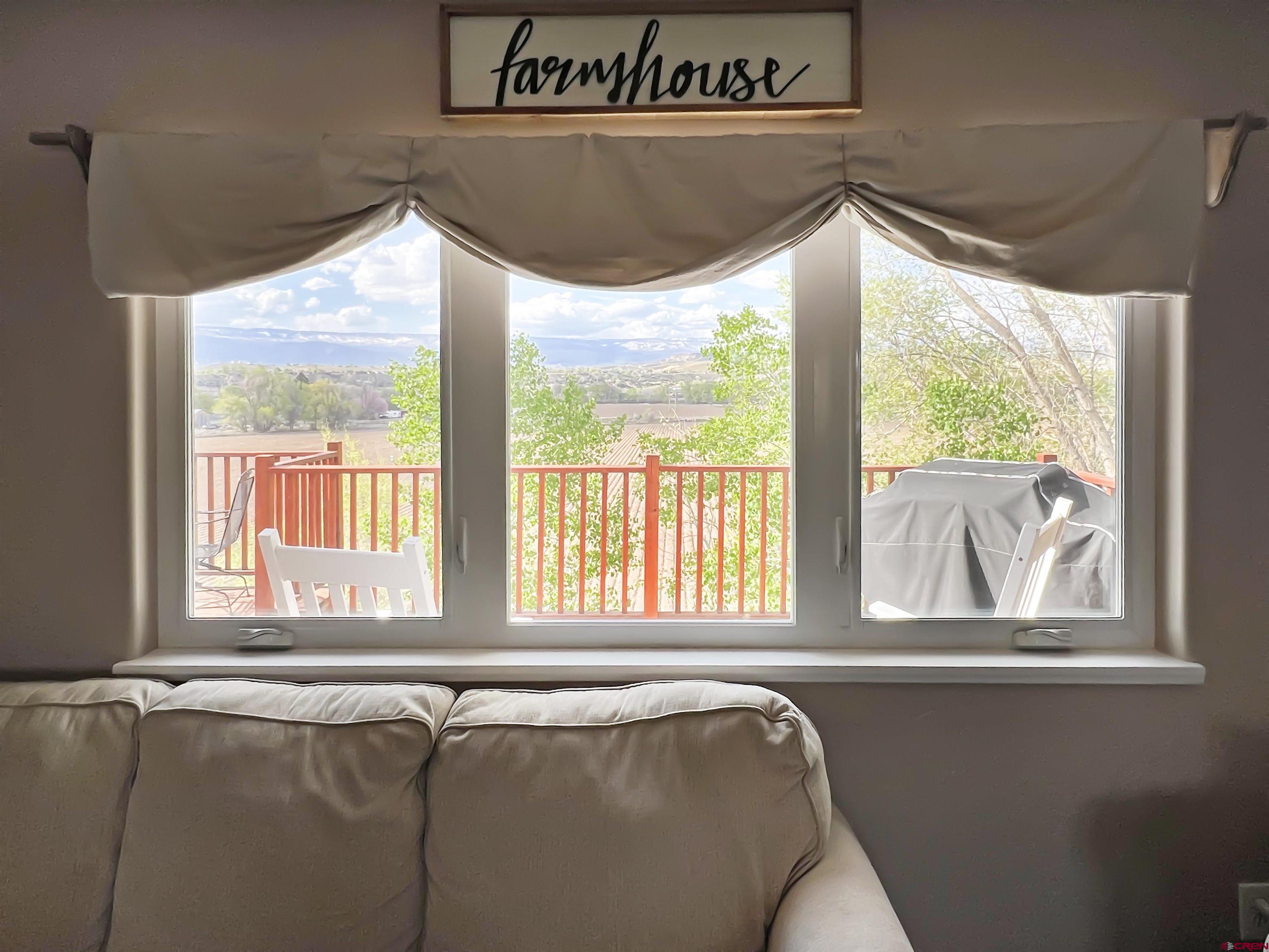 7571 2200th Road Delta, CO 81416 - Photo 7 of 35 a view of a living room with a large window
