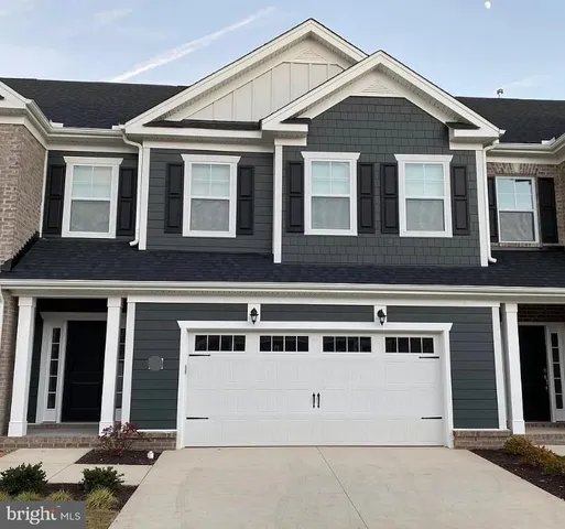 a front view of residential houses