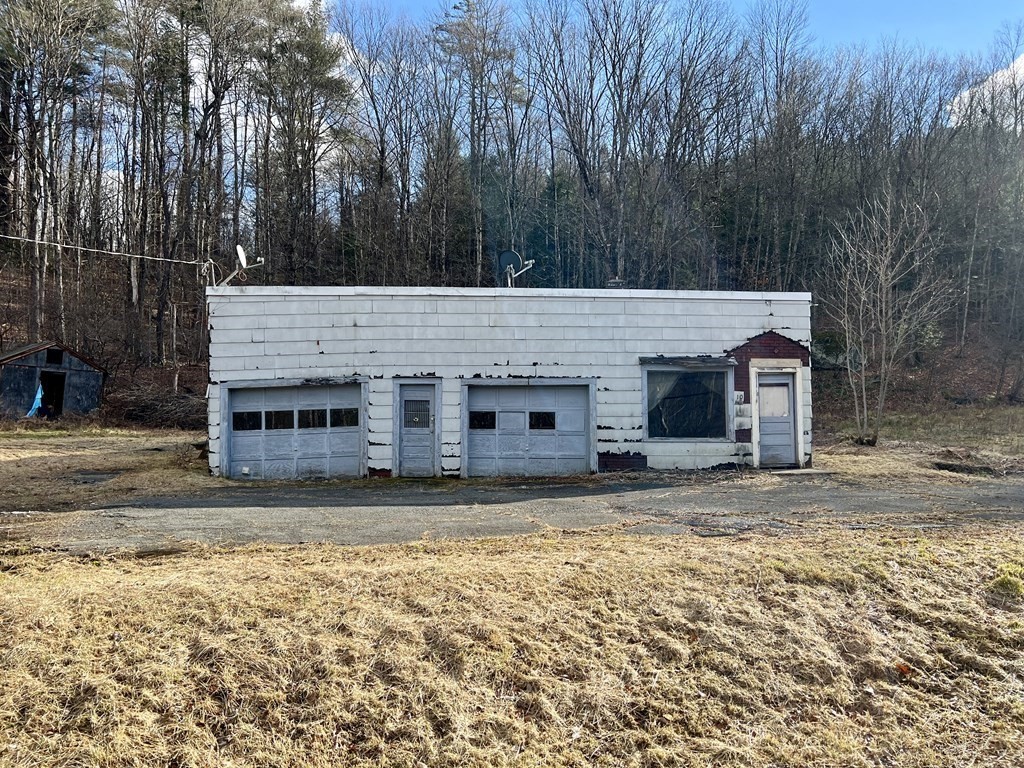 100 Main Road Colrain, MA 01340 - Photo 3 of 10 a view of a house with a yard
