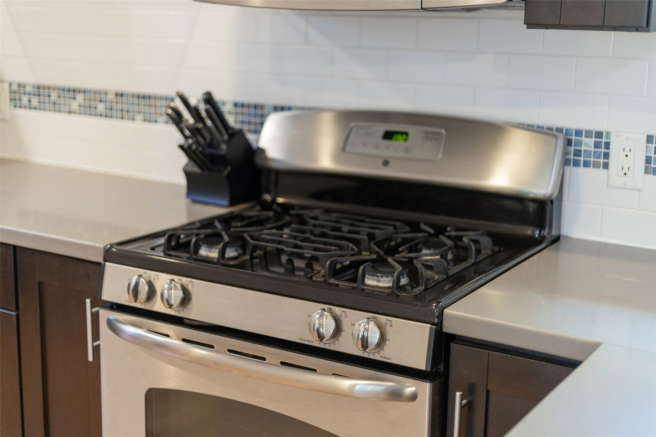 815 Columbus Street Austin, TX 78704 - Photo 10 of 39 a close up of a stove top oven sitting inside of a kitchen