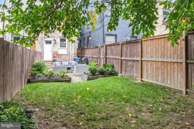 a view of a backyard with a garden