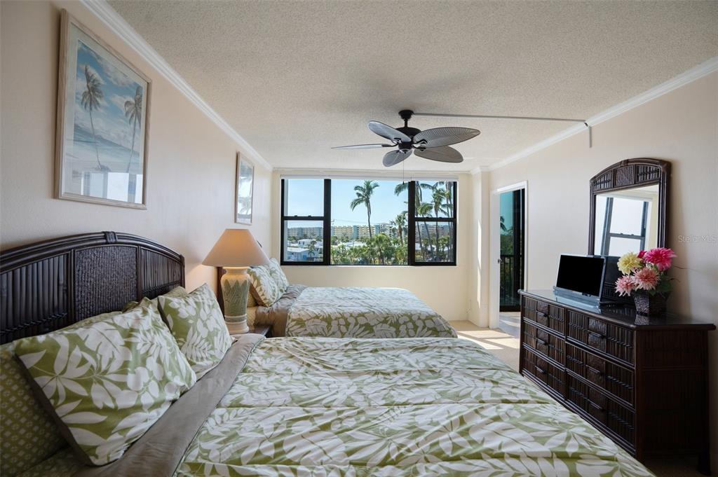 5855 Midnight Pass Road, Unit 327 Sarasota, FL 34242 - Photo 17 of 47 a living room with furniture fireplace and flat screen tv