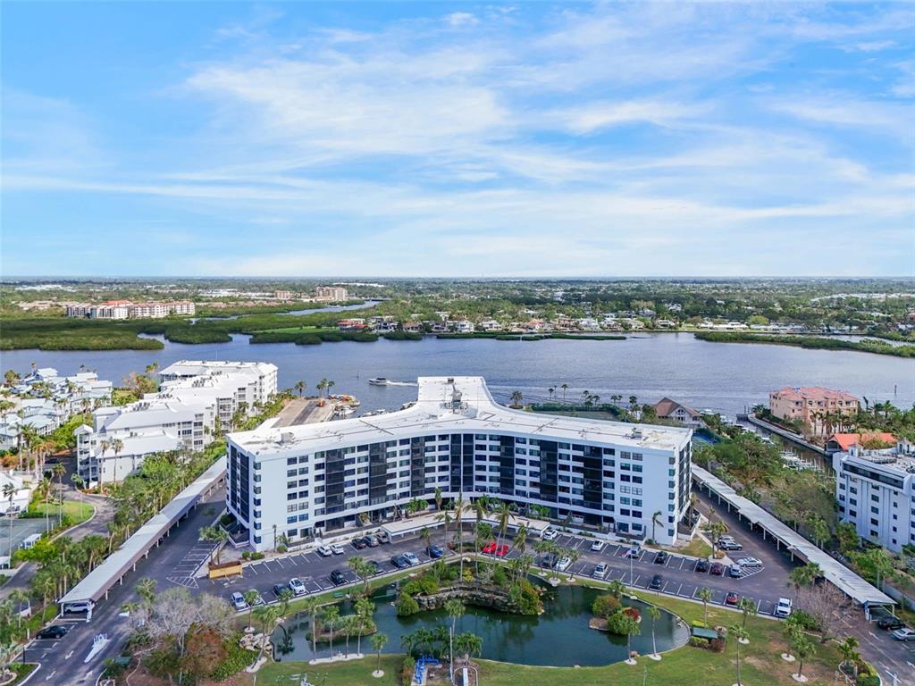 5855 Midnight Pass Road, Unit 327 Sarasota, FL 34242 - Photo 40 of 47 a view of a city and lake