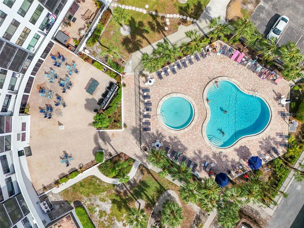 5855 Midnight Pass Road, Unit 327 Sarasota, FL 34242 - Photo 42 of 47 an aerial view of a house with a swimming pool