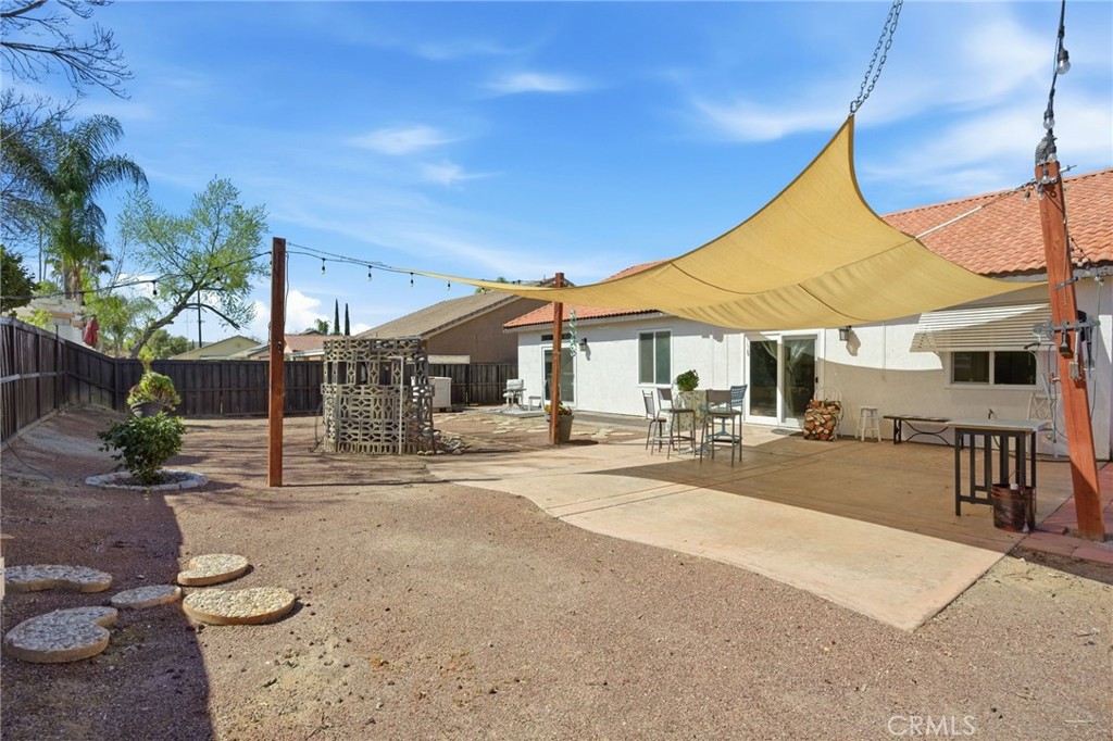 1853 Rue Chablis San Jacinto, CA 92583 - Photo 22 of 27 a view of a house with backyard and sitting area