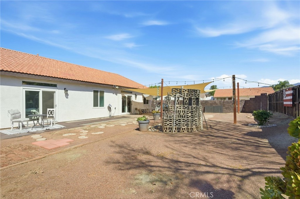 1853 Rue Chablis San Jacinto, CA 92583 - Photo 23 of 27 a view of a house with a patio